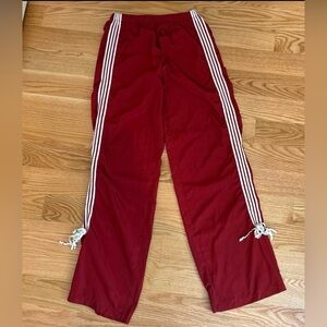 Red Track Pants with White Stripes